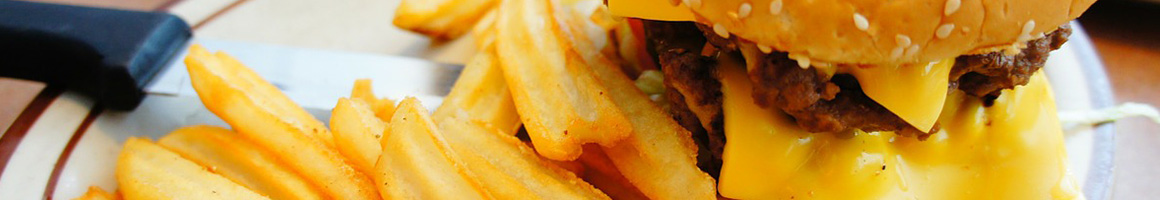 Eating Burger Cafe at Peak Burger restaurant in La Mirada, CA.